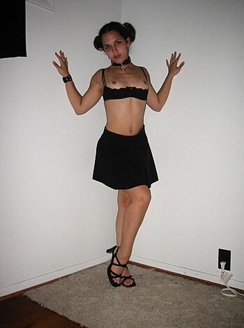 "Here's a naked chick with her tits hanging out."