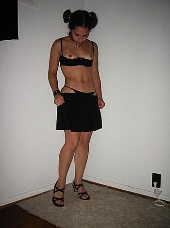 A chick in a tight ass skirt and thong

is sucking on a dick with a gaping mouth, her tits bouncing up and down. She's got a face that says she loves cock like nobody's business.