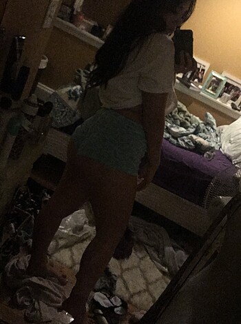 A hot chick in sexy undies struts her stuff in a dirty-ass room, with shit everywhere.
