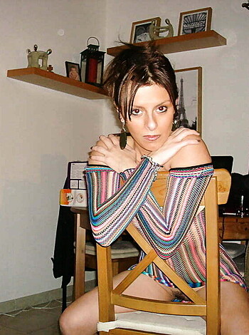 "Here's a busty broad in a tight t-shirt fucking sitting on a chair."