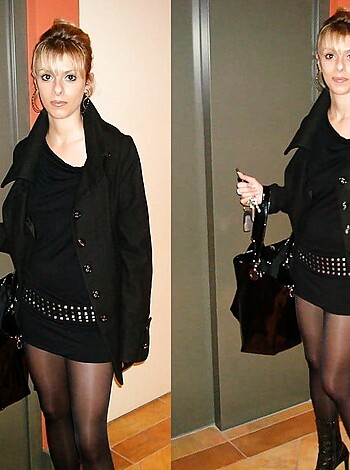 "Hot babe dressed in tight leather clothing, showing off her sexy legs."