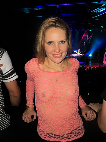 "Check out this hot babe in her fucking pink shirt, surrounded by a sea of dicks all trying to get a glimpse of her tight ass."