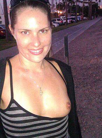 Here's a fucking picture of a woman with her tits out.