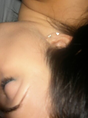 This is a picture of some broad with her eyes shut tight like a virgin's ass at prom night.