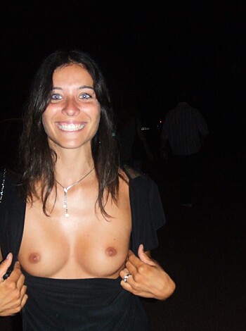 A bare-breasted chick is exposing her knockers while wearing just a bralette.