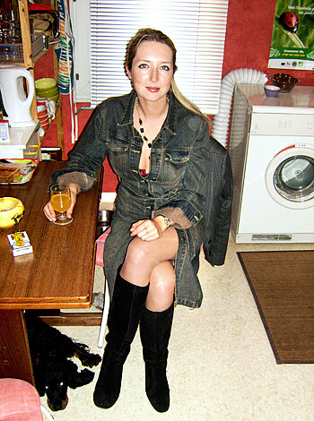 "Chick's got her legs spread, rockin' some high heels while sippin' on a drink in her crib."
