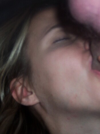 "Vulgar image caption rewritten - Blowjob with a dick in the woman's mouth."