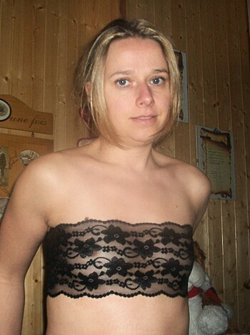 "Hot chick flaunting her tits and ass in front of the camera."