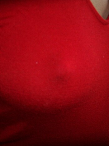"""
The f*cking woman's see-through top shows her titties and cleavage.
"""