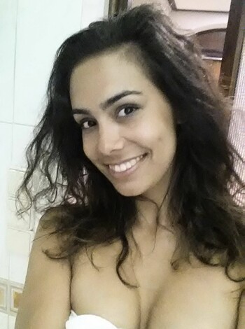 Image of naked bitch showing her teeth for the camera.