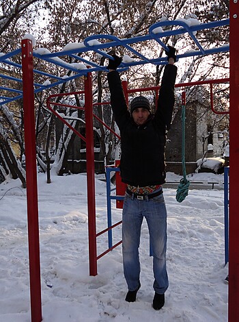 Vulgar description: "Dude lifting his own weight off the jungle gym."