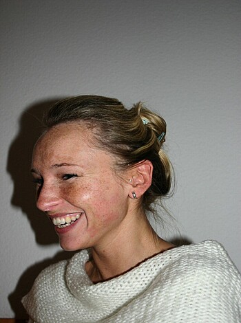 "This fucking image shows a busty blonde cunt with a stupid-ass grin on her dumb face."