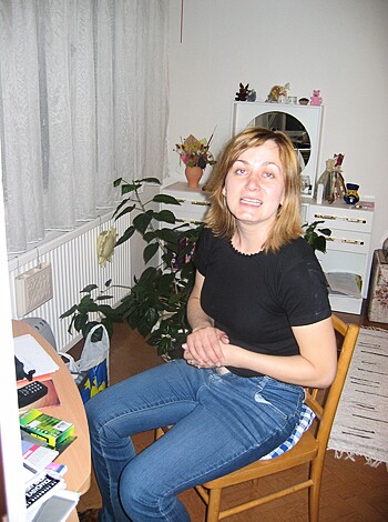Here's a pic of some busty blonde chick in a tight T-shirt flashing her knockers while grinning like a retard.