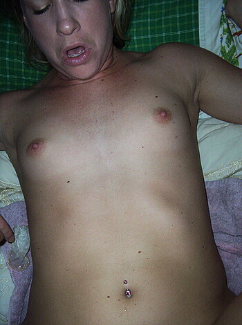 Image of a fucking hot blonde chick layin ass up on the sandy beach, lookin like she just got tapped by some big dick.