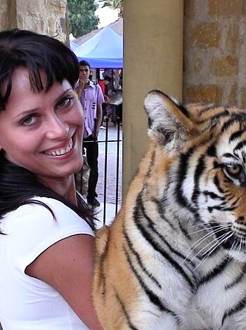"Check out this fuckin' chick with her hands all up on the tiggy cub, bro!"