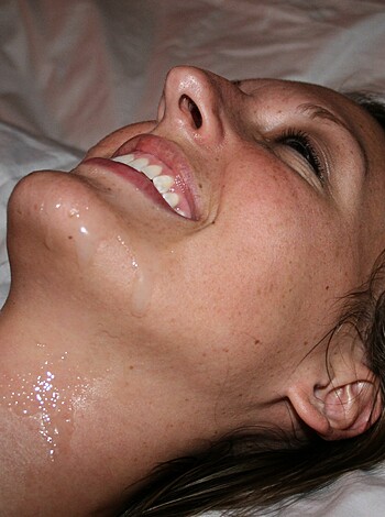 "
Here's a naked lady with her legs spread wide open, her tits hanging out and a big fucking grin on her face. She looks like she just got off after a long day of getting pounded by some dick. Fuck yeah, that shit's hot!