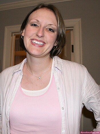 """
Hot babe showing her pearly whites for the lens.
"""