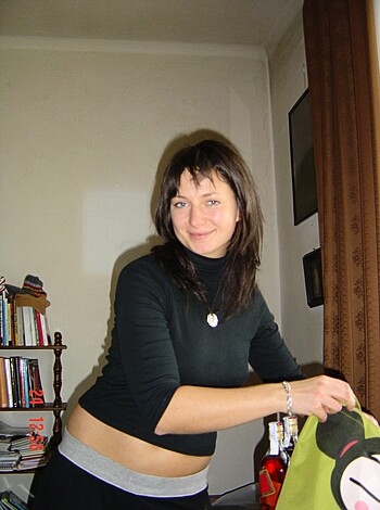 "Check out this bitch in her tight-ass black sweater, smirking while she leans on one hip."