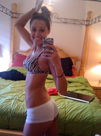 """
Here's a photo of some hot ass-cheeks in tight swimwear for you to gawk at, motherfucker. 
"""