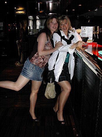 A couple of bitches getting sloshed and giggling like retards at some dive.