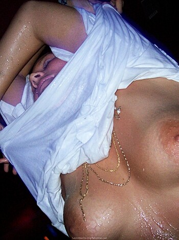 Here's a photo of a naked titty, with an eye-catching nipple and areola that is sure to grab your attention.