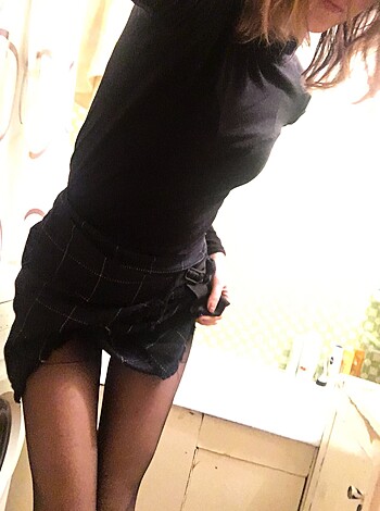Vulgar Description: "Tits n ass on display, red tights clinch tight, legs spread, pussy close."