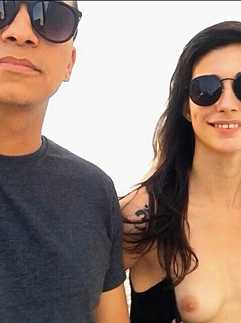 Fuckin' hell, check out this naked bitch titty fuckin' with some dude!