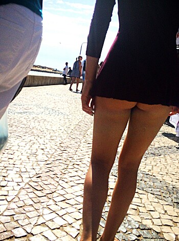 Vulgar description: A fucking hot ass bitch walking through the street with her tight ass cheeks hanging out, causing every dude around to stare at her like they wanna fuck her so damn bad.