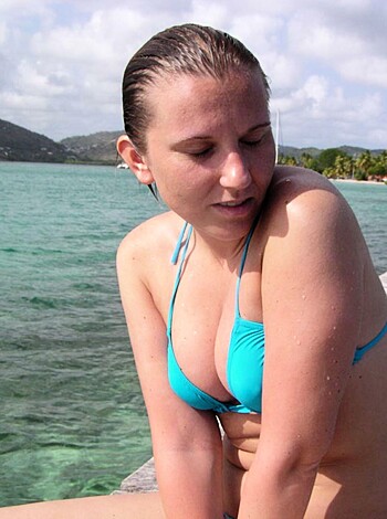 "Check out this chick sunbathing her tits on the dock, ass up in some shitty bikini."