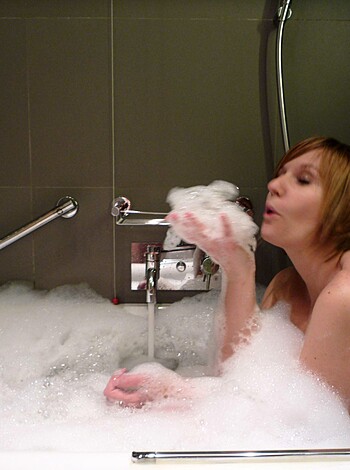 "Chick is all hot and soapy, frothing up the bathwater with her mouth like some kind of fucking seal or dolphin or shit while bubble-blowing bubbles float to the surface."