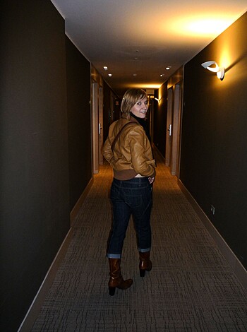 "Hot chick decked out in sexy leather jacket and tight-ass jeans."