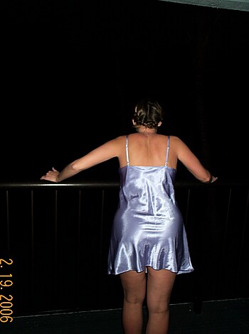 "This image is of some bitch who's too fucking lazy to put on clothes and stands like a retarded slut on a balcony, probably waiting for some guy to cum all over her face."