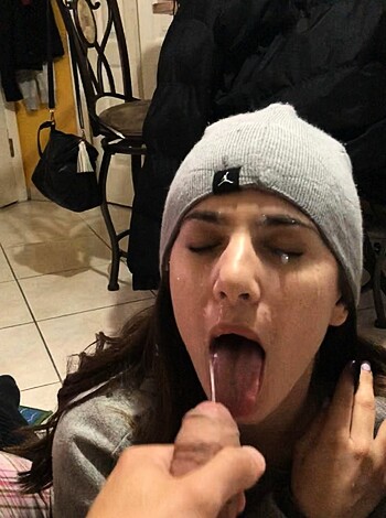 A dude is jerking off and some bitch is sucking his dick like it's her job, 30 words or less.