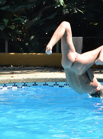 Vulgar description: The fucking naked guy is swimming like an asshole without any clothes on, dude.